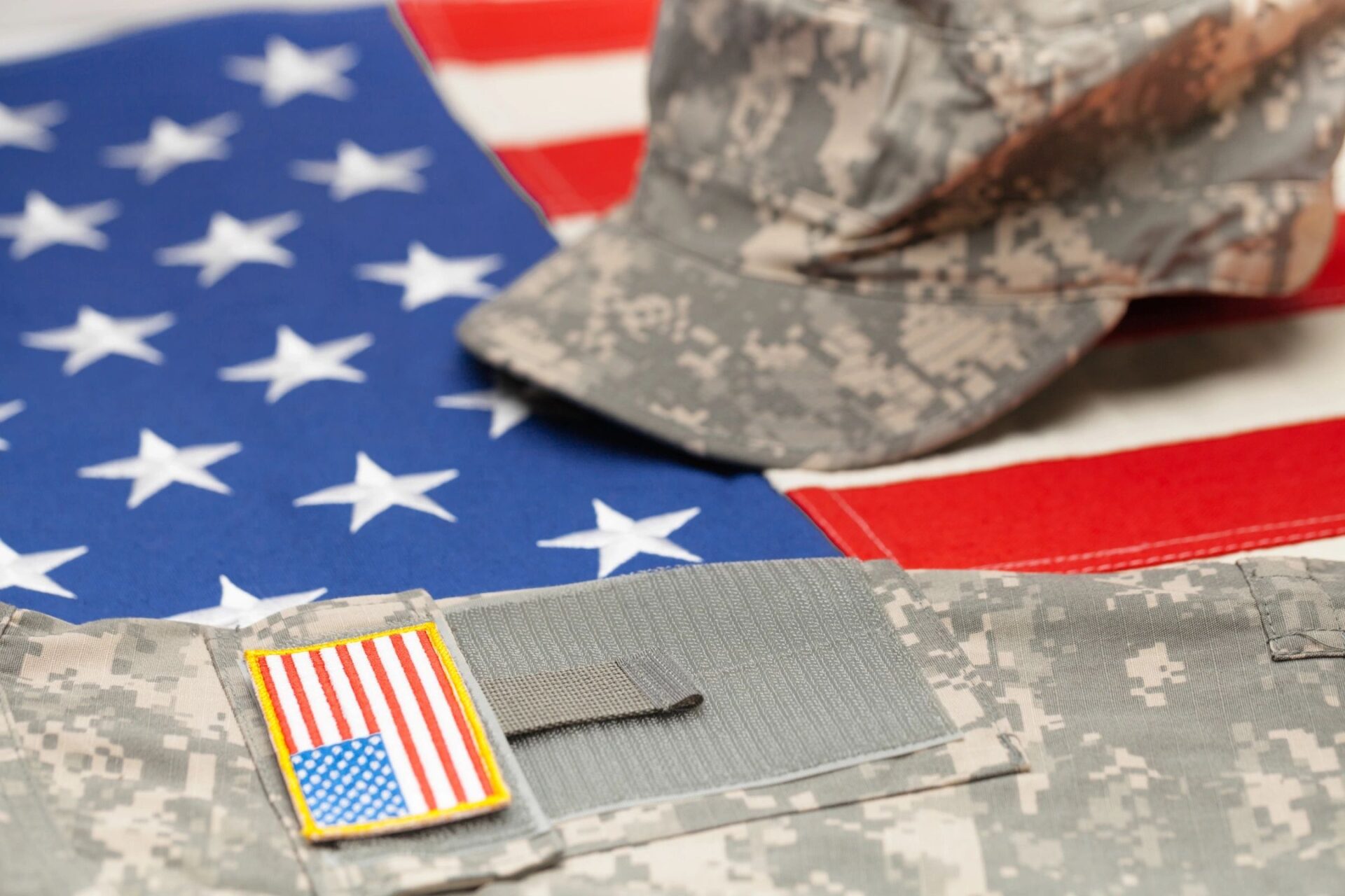 qtq80-ZEveKD.jpeg A picture of a military uniform and US flag